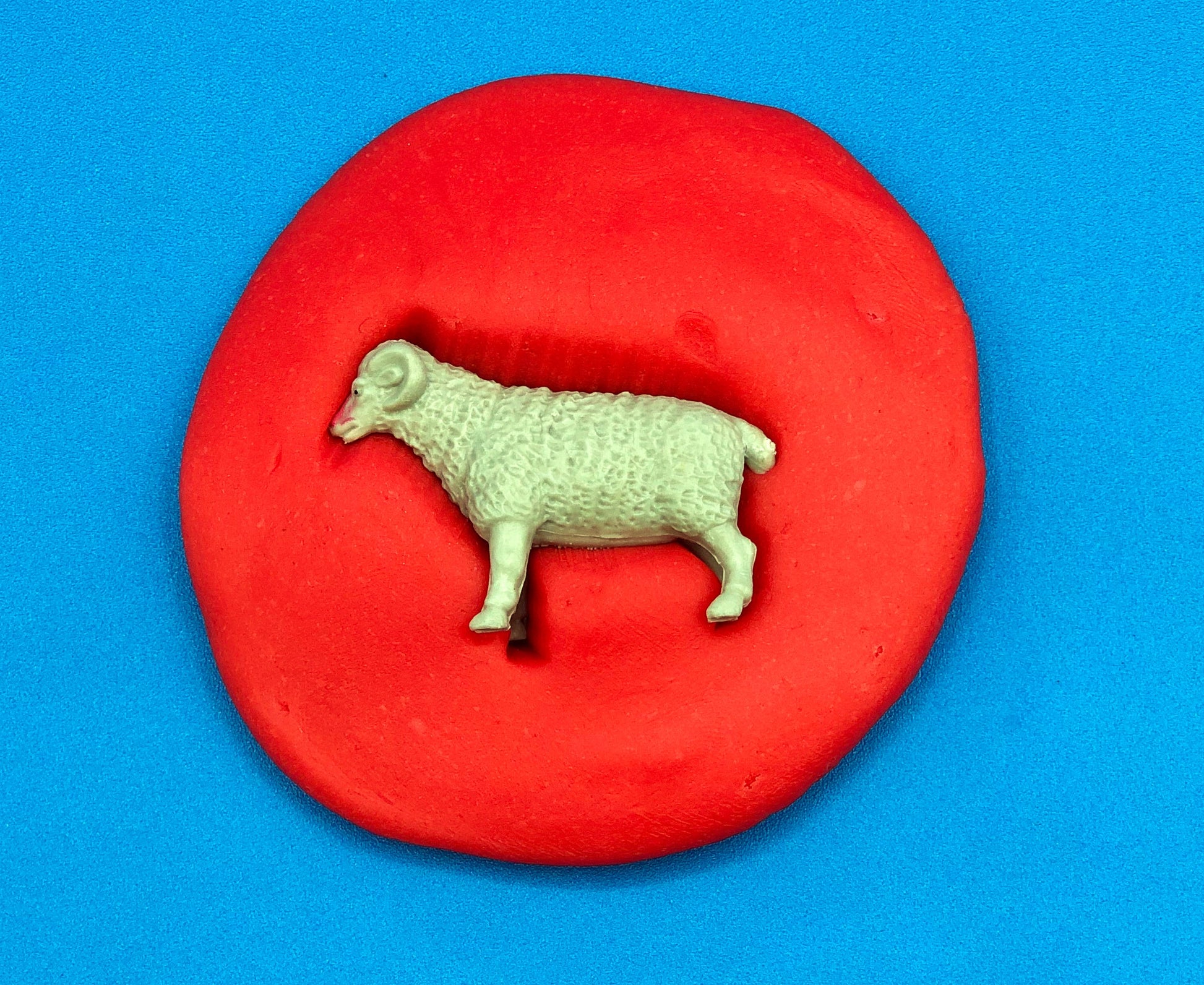 animal stamp in playdough
