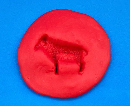 animal impression in playdough