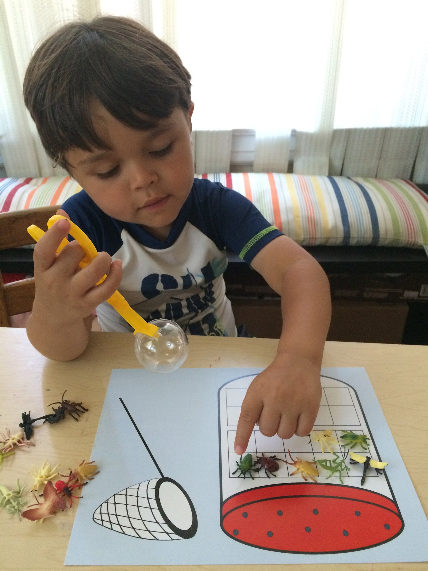 Math Activity - Bug Catching Game Inspired by The Very Lonely Firefly by Eric Carle